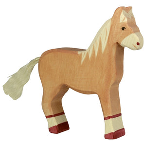 Holztiger Horse standing in light brown