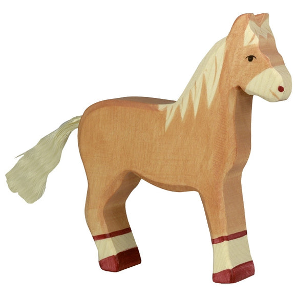 Holztiger Horse standing in light brown